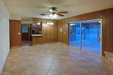 family room off kitchen with FP
