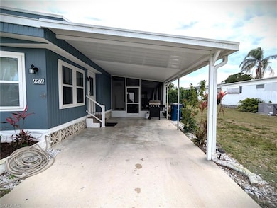 View of patio with cooling unit, entry steps, a gr