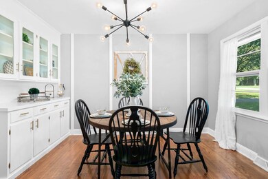 The dining room has a beautiful built in cabinet!