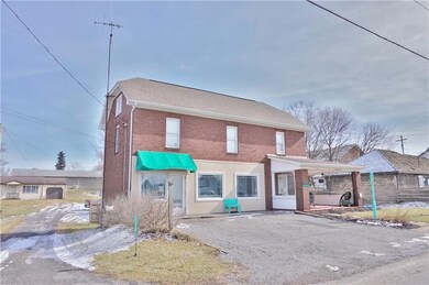 Plenty of parking, large front porch, and close en
