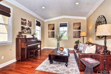 Formal living room with distressed hardwood floori