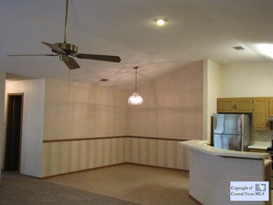 Dining/Kitchen Area: Dining, kitchen & living area