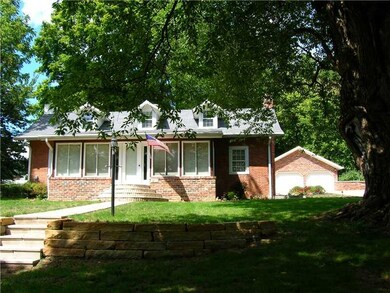 Exterior Front. FRONT VIEW OF HOME AND GARAGE