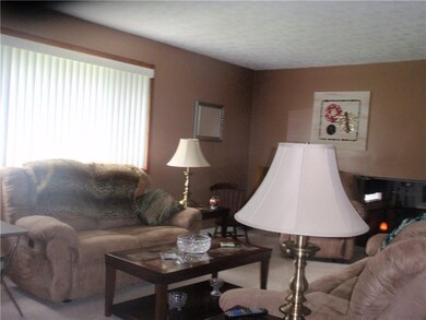 Living room with wall to wall carpet.