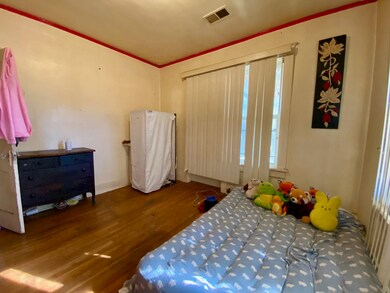 Bedroom featuring hardwood / wood-style floors