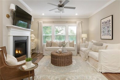 Spacious living room with wall of windows and cozy