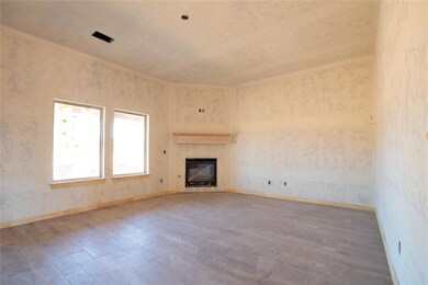 Unfurnished living room with light hardwood / wood-style flooring