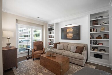Sophisticated formal living room with custom desig
