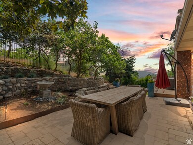 Patio terrace at dusk with a patio area and outdoor dining area