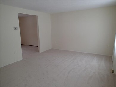 Great neutral living room with two windows for lig