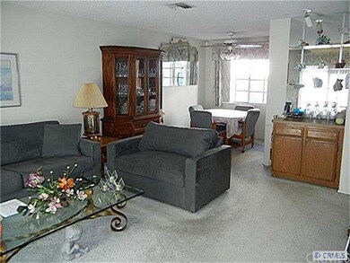Large Living Room has a wet bar and lots of light