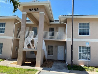 Townhome / multi-family property with a balcony