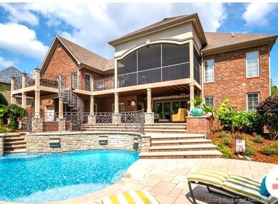 Rear elevation. Screen Porch. Utility Garage. Hot 