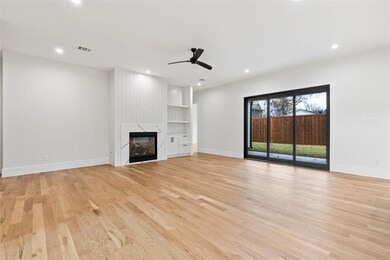 Large open concept living area with sliding panel 