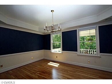 Dining Room - dining room has tray ceiling and cha