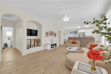 Living room featuring light wood finished floors,