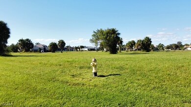 View of community featuring a lawn