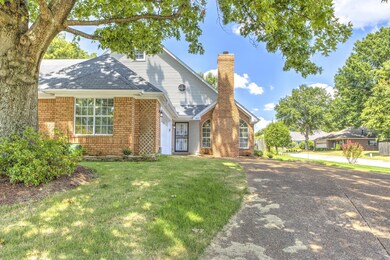 View of front of home featuring a front lawn