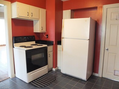 Kitchen comes applianced with oven, range and refr