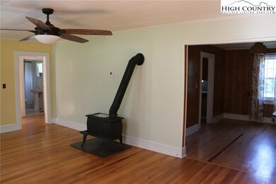 The wood stove in the family room helps to knock o