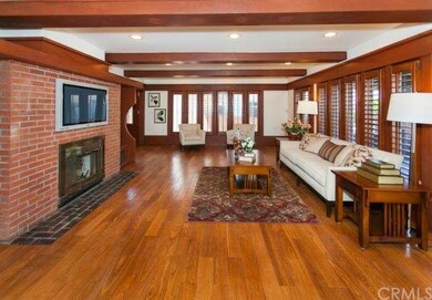 Living Room w/ beautiful hardwood flooring & wood 