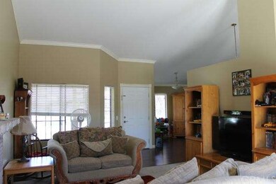 Living room view looking towards the front door.