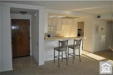 view to kitchen and laundry room
