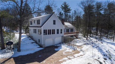 Dual bay heated garage beneath with...