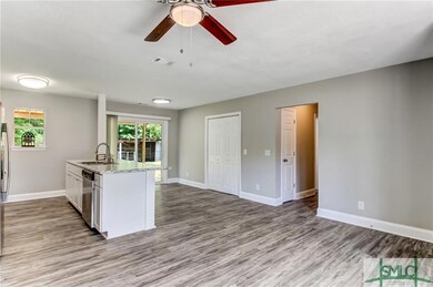 OPEN CONCEPT LIVING ROOM AND KITCHEN