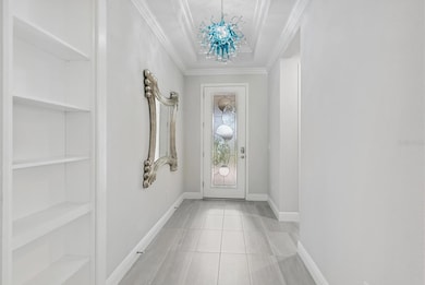 Enter through your decorative glass front door to the foyer and let the high ceilings welcome you in. Mirror conveys.