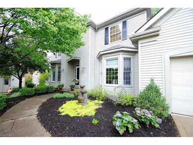 Gentle fountain graces the front.