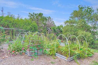 View of yard with a garden