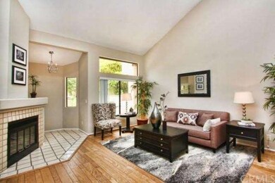 Living room with vaulted ceilings, custom paint, f