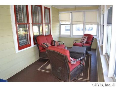 Porch - Enclosed. The enclosed front porch adds mo