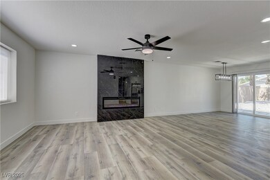 Unfurnished living room with wood finished floors,