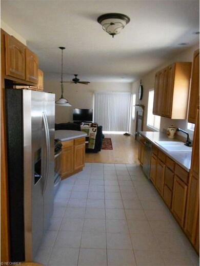 Amazing eat-in kitchen that has ceramic flooring a