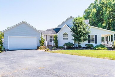 Attached 2 car garage and lovely side porch