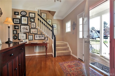 Spacious foyer with two coat closets.