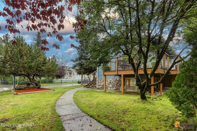 Winding Walkway Through Fenced Yard