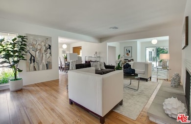 Open floor plan Living room with fireplace