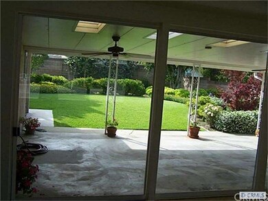 view from livling room to park-like rearyard
