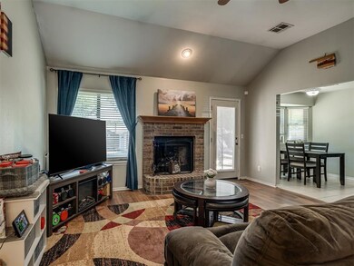 Traditional wood burning fireplace is the focal point of the living room!