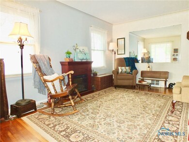 This bright living room welcomes you into the home