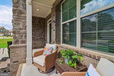 Enjoy the Sunny Front Porch Area