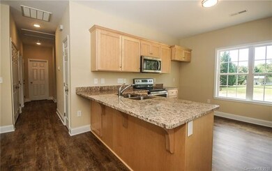 Beautiful granite counter tops. Stainless applianc