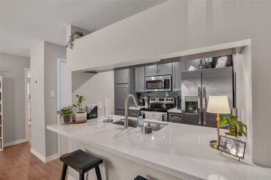 Quartz counter top, custom cabinets, soft drawer c