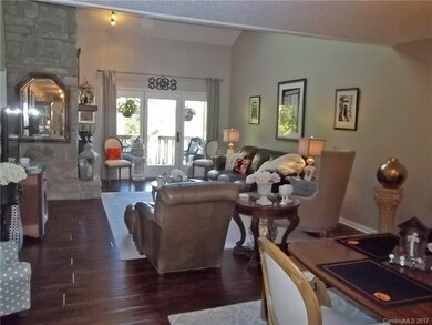 Living room with vaulted ceiling
