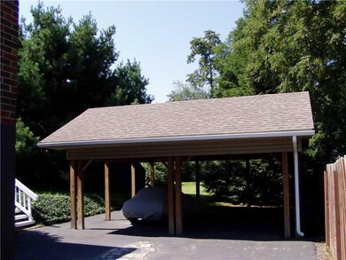 Exterior Back. Pavilion, carport, picnic back yard