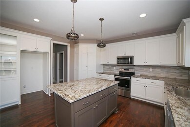 434 Spring Branch Dr, Raymore, MO 64083 - photo 5