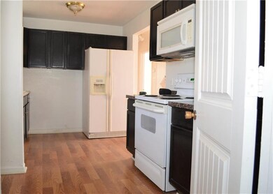 Kitchen from garage doorway